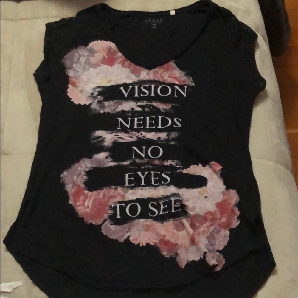 Motivational quote on a black tshirt with flowers